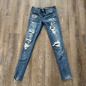 American Eagle Outfitters Blue Distressed Super Stretch Skinny Jeans